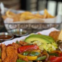 Chicken Fajitas Lunch · Grilled Chicken breast bell peppers, onions, rice, beans, salad