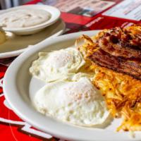 Bacon Or Sausage & Eggs · Two eggs served with bacon or sausage.