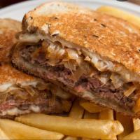 Jake'S Patty Melt · 1/3 pound burger served on rye bread, swiss and American cheese with grilled onion. The true...