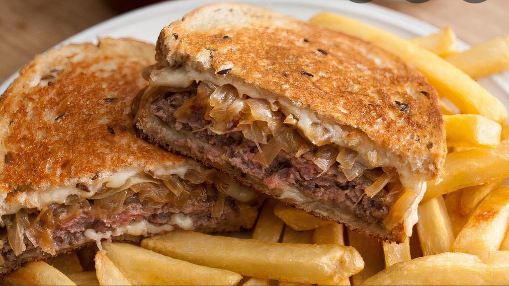 Jake'S Patty Melt · 1/3 pound burger served on rye bread, swiss and American cheese with grilled onion. The true patty melt!