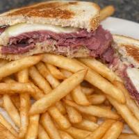 Reuben Sandwich On Rye · Homecooked corn beef, swiss cheese and sauerkraut your choice of thousand island dressing or...