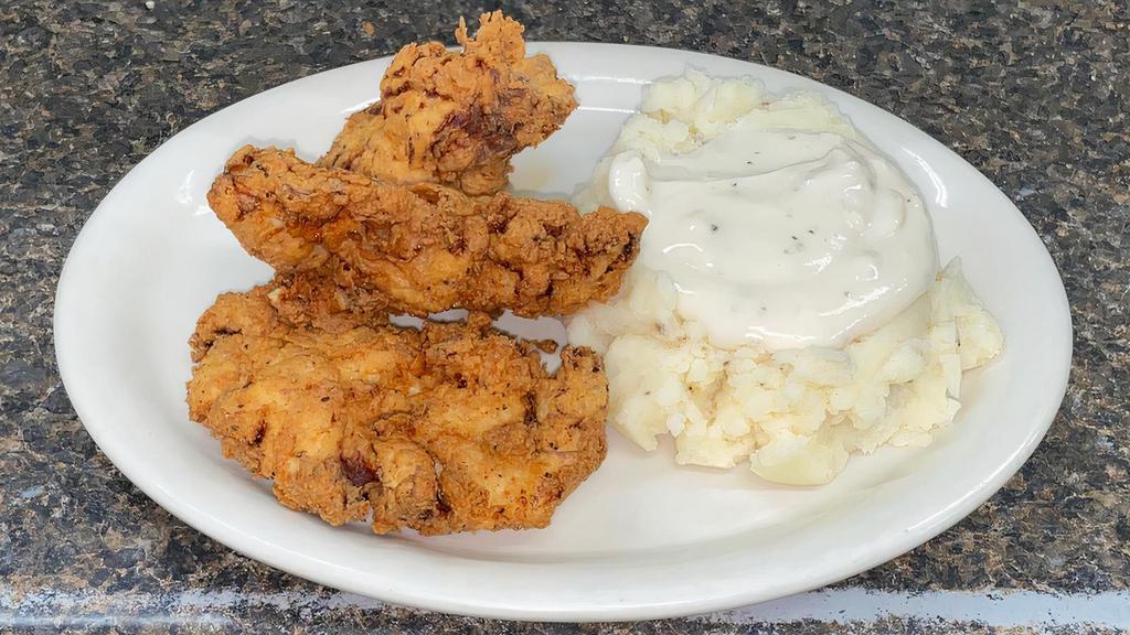 Fried Chicken Tenders · Strips of chicken breast, breaded and deep fried served with homemade white gravy.