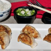 Pot Stickers (6) · Dumplings filled with ground pork and vegetables.