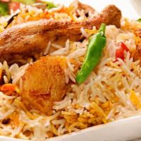 Chicken Biryani · Chicken leg and thigh cooked with basmati rice.
