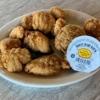 Chicken Tenders · Breaded, fried and served with your choice of sauce.