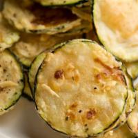 Breaded Zucchini  · Fresh zucchini breaded and fried till golden-brown.
