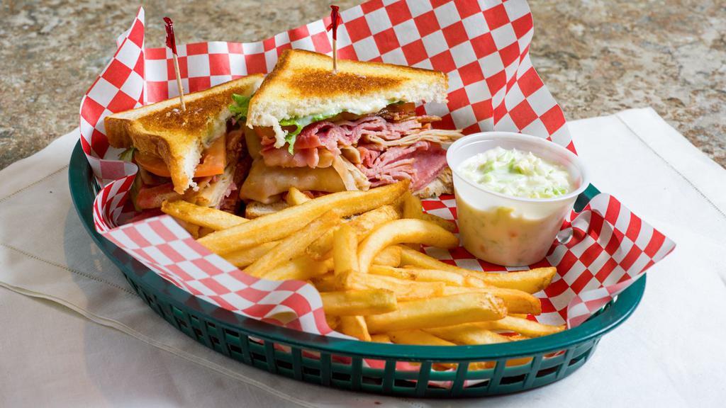 Club Royal · Fresh sliced turkey, ham, thick-cut bacon, lettuce, tomato, mayo and swiss toasted on white or wheat bread.