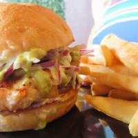 Pan Con Pollo · One of the most exotic tasting chicken sandwiches you’ll ever try.  Grilled chicken smothere...