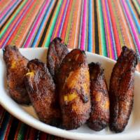 Maduros Frito · Sweet and sticky fried banana plaintains.