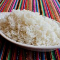 White Rice · Arroz blanco - white rice made with garlic.