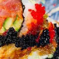 Fireball Roll · 8 pieces. Spicy tuna, cucumber, and crunch. Topped with masago, 3 types of tobiko, eel sauce...