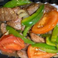 Thai Pepper Chicken Or Steak · Stir-fried tender sliced of beef or chicken with green pepper, tomato, onion, and black pepp...