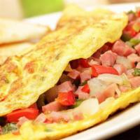 #3 Huevos En Torta Servido Con Cubos De Papa / Omelet Served With French Fries · Vegetales y carne for an extra charge / Veggies or meat for an extra charge.