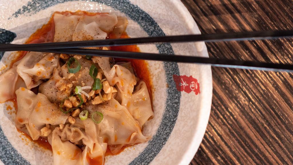 Sichuan Wonton In Chili Oil · Spicy. Pork wonton with scallion, chopped peanuts in chili oil.