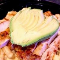 Chicken Avocado Mac · Grilled chicken breast and sliced avocado on top of cavatappi noodles with homemade 3 cheese...