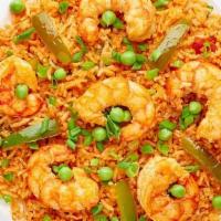 Fb'S Shrimp Biryani · Aromatic rice flavored with shrimp, fragrant with saffron, garnished with raisins and cashews.
