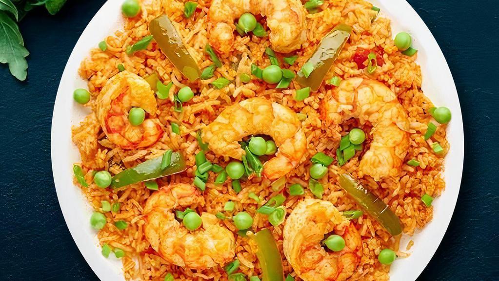 Fb'S Shrimp Biryani · Aromatic rice flavored with shrimp, fragrant with saffron, garnished with raisins and cashews.