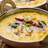 Dal · A traditional dish of yellow lentils.