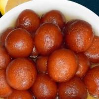 Gulab Jamun · Deep fried milk balls in sweet syrup.