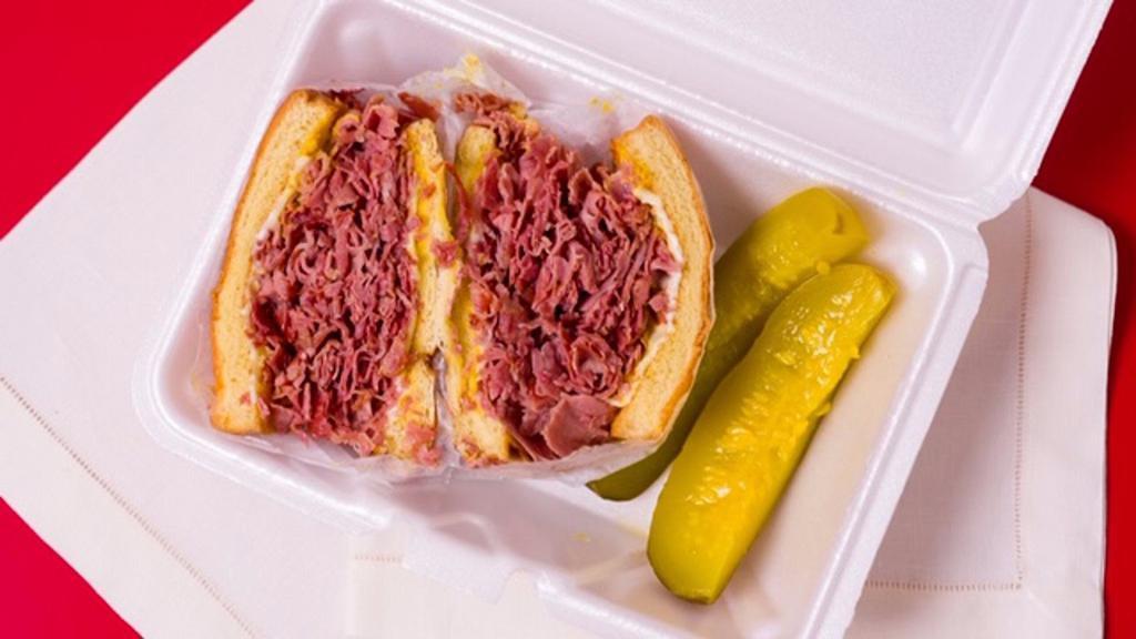 Corned Beef Sandwich · Served on an onion roll or rye Add cheese with an additional charge