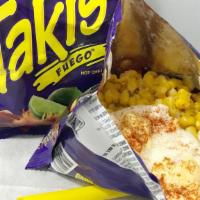 Takis With Elote · Takis Chips with corn right out of cob, mayo, grated cheese, and ground chile
