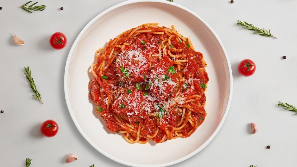 Miss Meatball Pasta (Spaghetti) · Fresh spaghetti and homemade ground beef meatballs served with rossa (red) sauce, red pepper flakes, and parmesan.