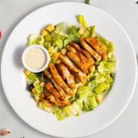Cheeky Caesar Salad  · Romaine lettuce, grilled chicken, house croutons, and parmesan cheese tossed with caesar dre...