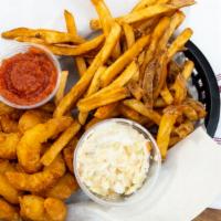 Fried Shrimp Basket · A giant basket of succulent beer battered fried shrimp with a pile of Gus's famous homemade ...