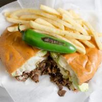 Torta De Carne Asada · Torta with Grilled Steak, Lettuce, Tomato, Cheese, Avocado, Jalapeno, and Mayonnaise.