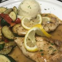 Limone · sautéed in lemon and white wine, served with mashed potatoes and vegetables of the day.