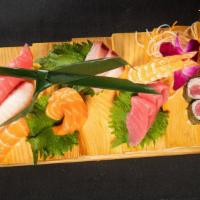 Sushi & Sashimi Combo · Raw fish.5 pieces of sushi, 9 pieces of sashimi & tuna roll.
