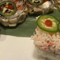Thunder Roll (5 Pieces) · Real crab mix, kani, avocado, cream cheese, jalapeno, tempura fried, eel sauce, siracha.
