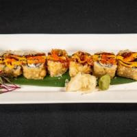 Crazy Maki · Salmon, cream cheese , Jalapeno, dip fry and topped with Eel sauce, spicy mayo sauce , ma-sa...