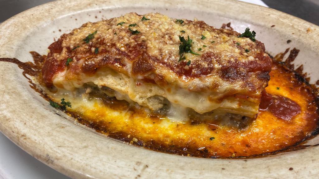 Lasagna · Ground beef, mozzarella and ricotta cheese