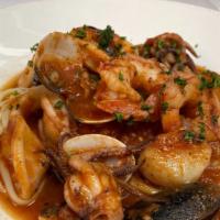 Zuppa Di Mare  · Sautéed scallops, shrimp, calamari, clams & mussels, simmered in marinara sauce served over ...
