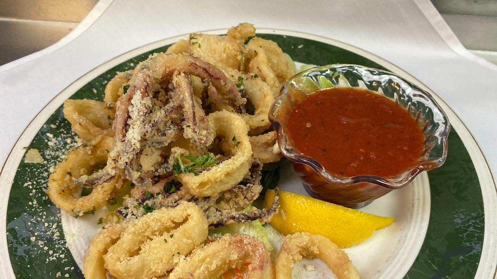 Deep Fried Calamari · With marinara sauce.