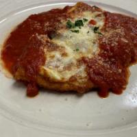 Veal Parmigiana  · Tender breaded veal sautéed and baked to perfection