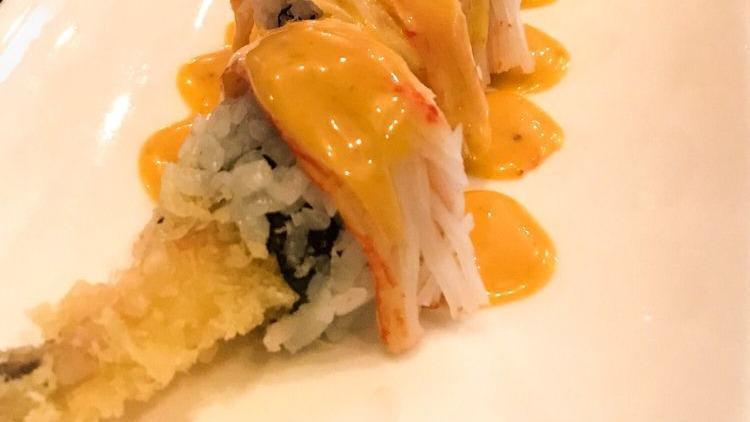 Spicy Cowboy Roll · Inside: shrimp tempura; Outside:
& spicy mayo.