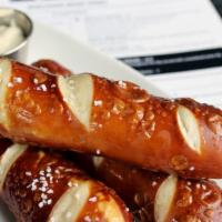 Soft Pretzel Sticks · made from scratch throughout the day, served with caramelized onion dip. Add Hatch chili que...