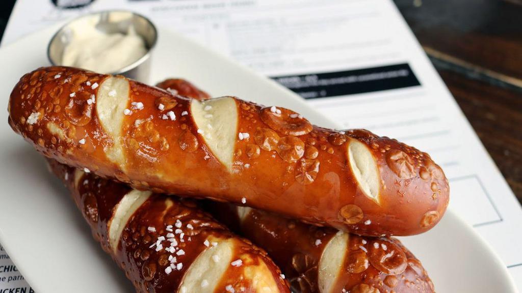 Soft Pretzel Sticks · made from scratch throughout the day, served with caramelized onion dip. Add Hatch chili queso (+3.50)