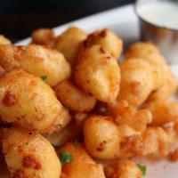 Crispy Cheese Curds · beer-battered using local craft beer, fried until crispy, served with homemade buttermilk ra...