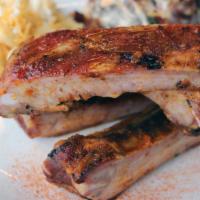 Louis Cut Spareribs (Gf) · half slab of dry rubbed, applewood smoked, thick & meaty spareribs