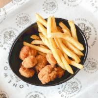 Kids Popcorn Chicken · With fries and sweet chili sauce.