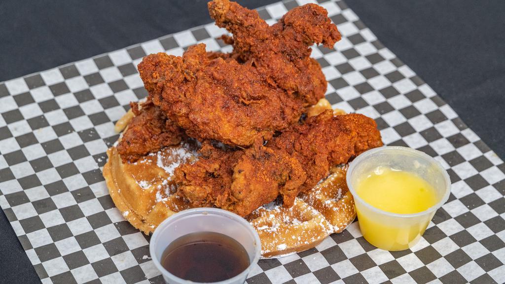 3 Wings & Waffle · Served with honey butter, warm maple syrup on a Belgian waffle.