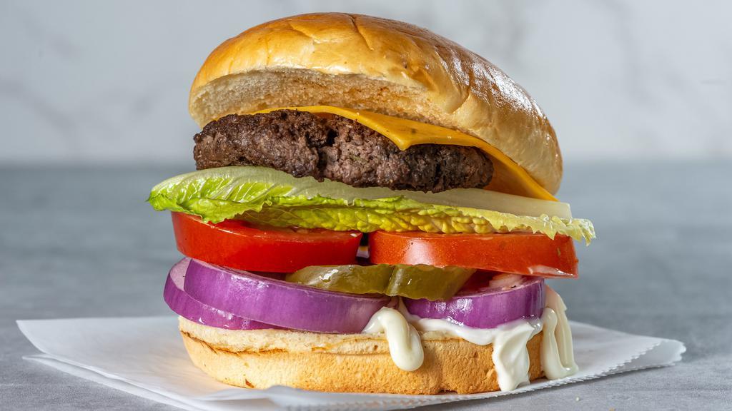 Works Burger · Home-made beef patty, American cheese ,mayo, lettuce, onion, tomato and pickles.