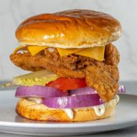 Chicken Fillet · Most popular. Hand-battered, crispy fried chicken breast filet,American cheese, onions, toma...