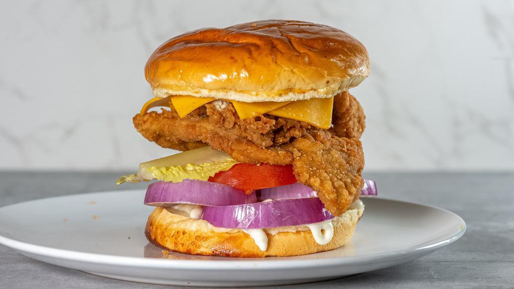 Chicken Fillet · Most popular. Hand-battered, crispy fried chicken breast filet,American cheese, onions, tomato, lettuce, pickles and mayo.