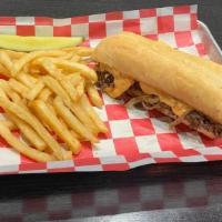 New Hudson Cheese Steak · Rib-eye steak, topped with grilled onions and creamy pub cheese, all on a lightly toasted ho...