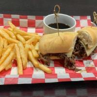 French Dip W/ Side Of Au Jus Sauce · This slices of rib-eye with melted Swiss cheese & grilled onions, served on a grilled hoagie...