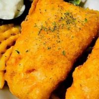 2 Piece Fish · North Atlantic cod loins , hand dipped in a light  house beer batter served with waffle frie...